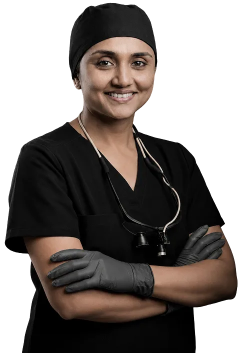 Dr. Purvi Patel, certified Ultimate Smile Designer specializing in cosmetic dentistry and smile makeovers in Surat
